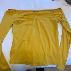 Long sleeve off the shoulder